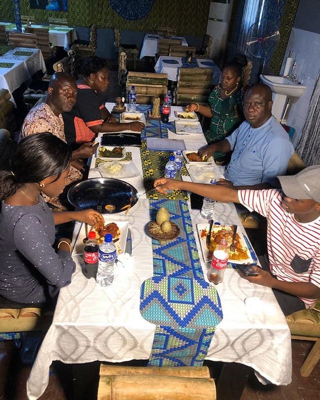 several people having great meals in ekuro restaurant at ffaresort in akure